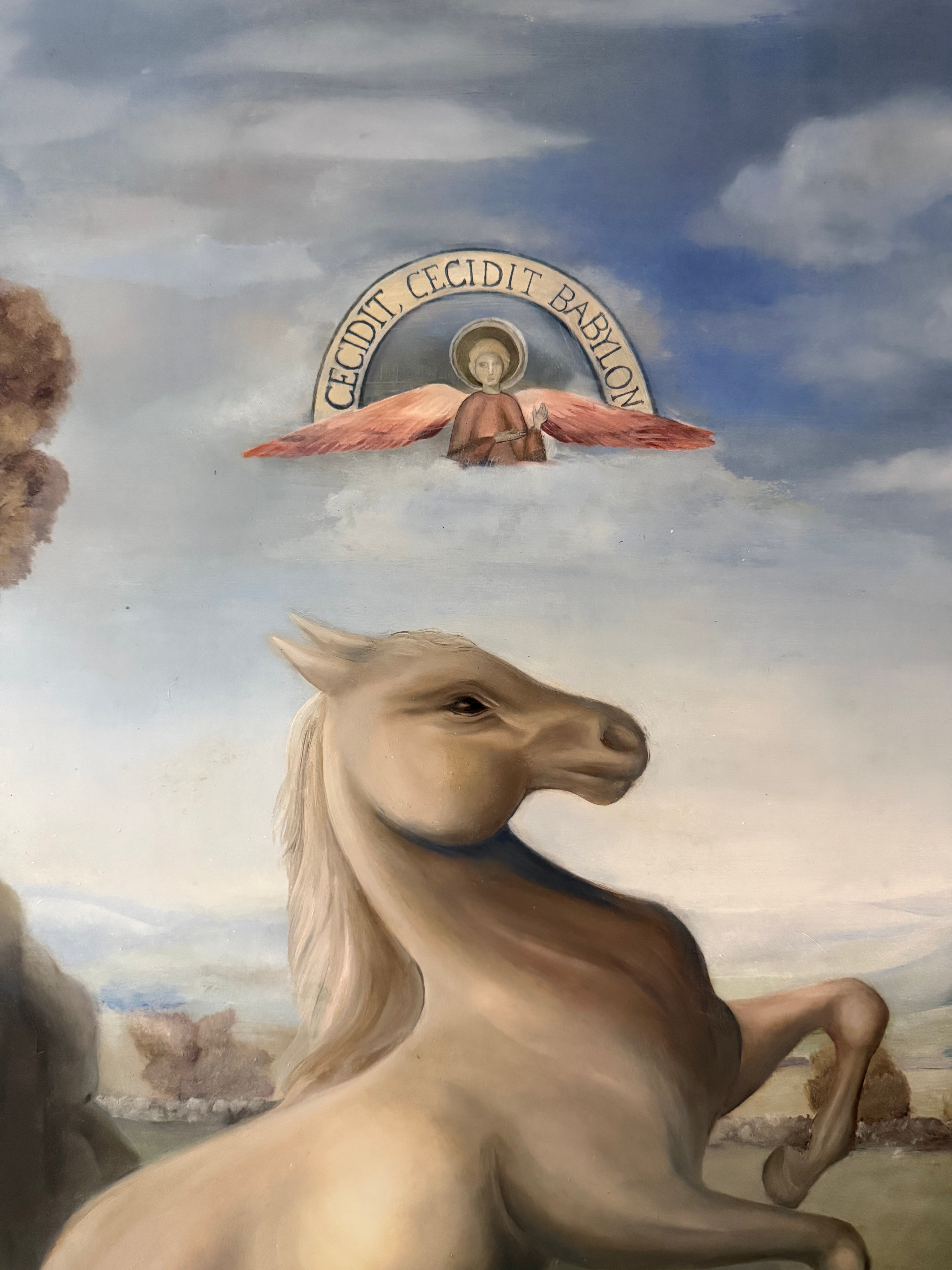 Horse in a landscape with an angel and text in the sky - detail shot of an oil painting by Kate McDuffie 