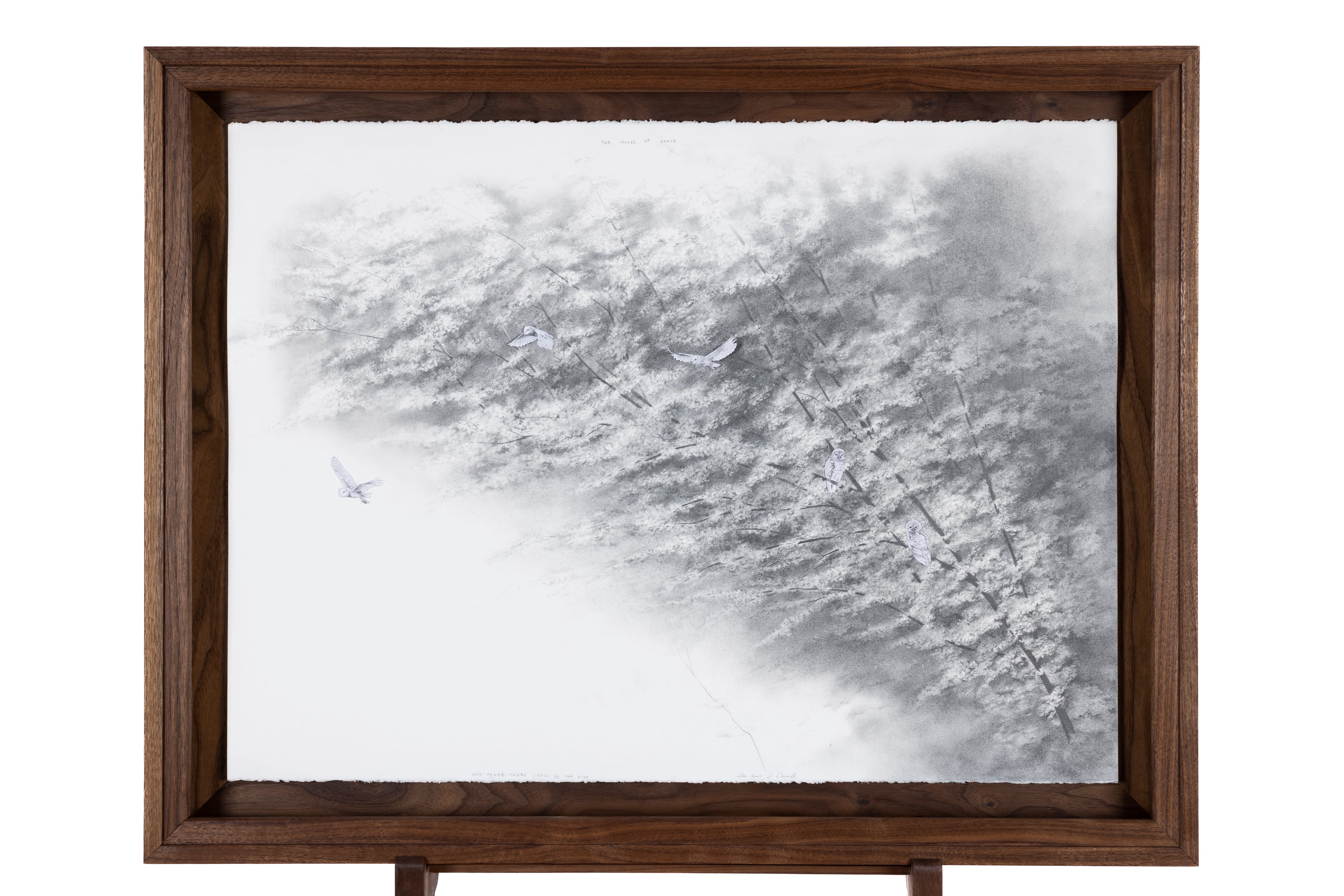 Framed abstract artwork with a textured surface on a white background