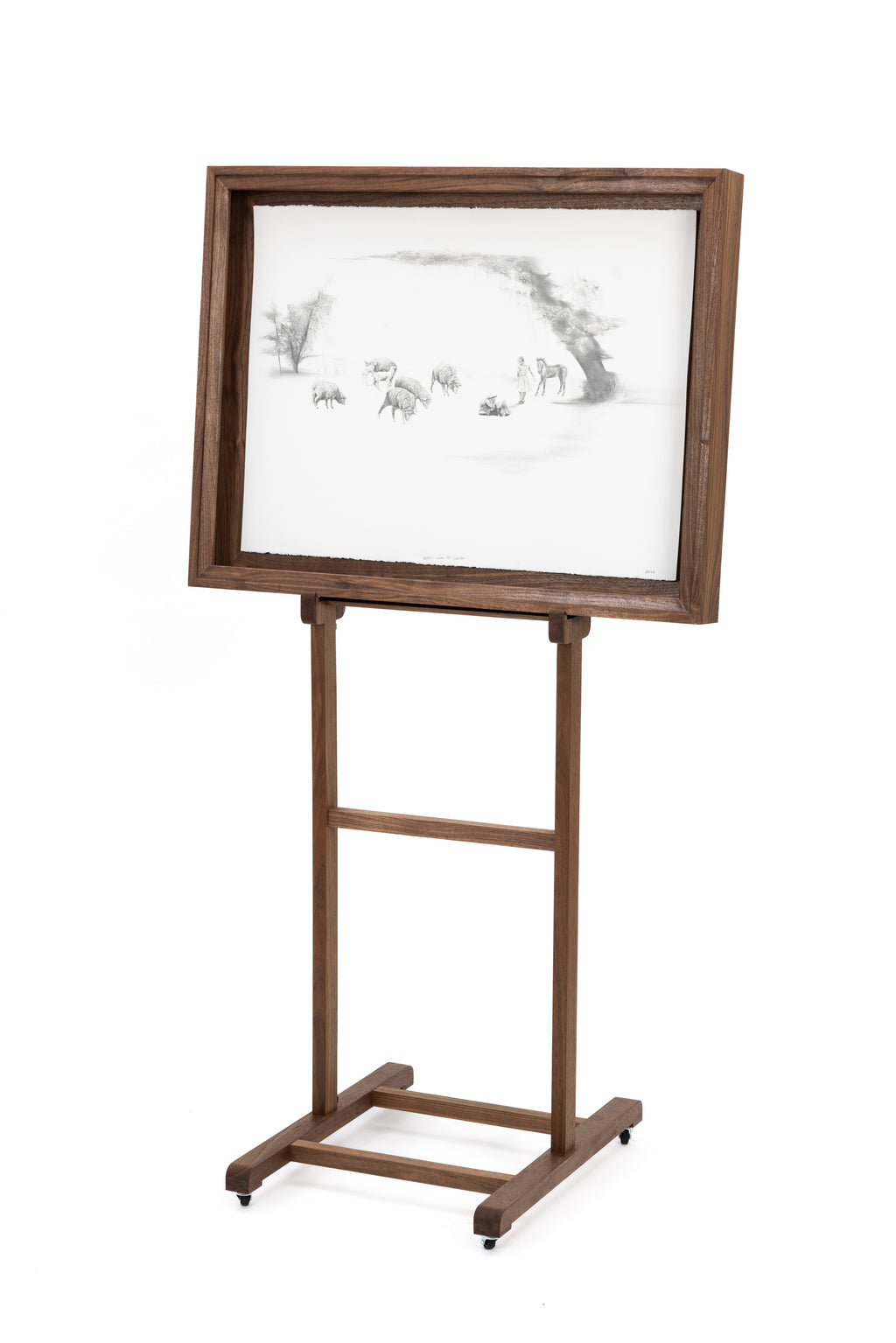 Framed artwork on a stand with a white background