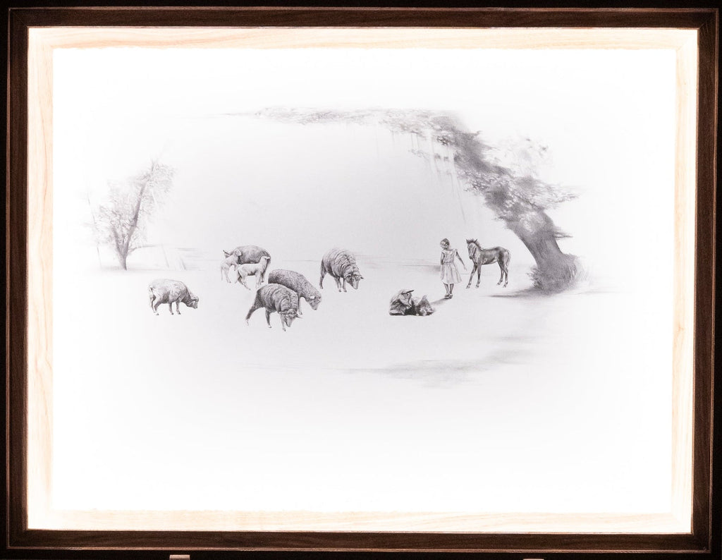 Framed black and white drawing of girl and animals in a dreamy landscape